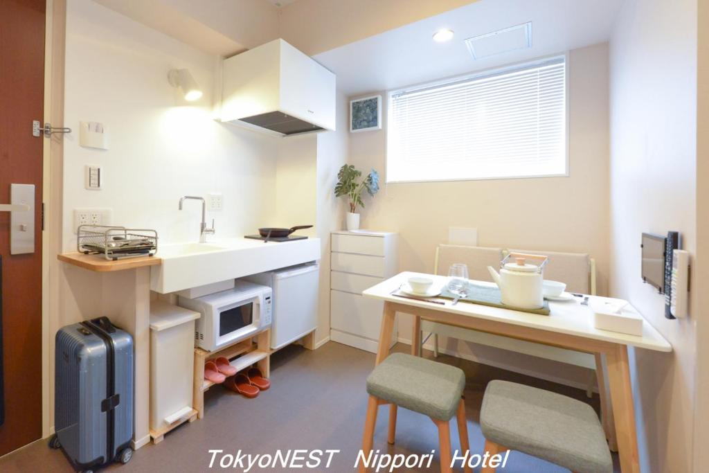 Kuchyň nebo kuchyňský kout v ubytování TokyoNEST Nippori