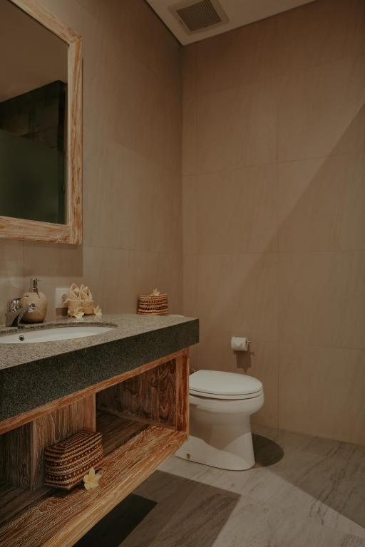 Koupelna v ubytování LASTANA SUITE UBUD