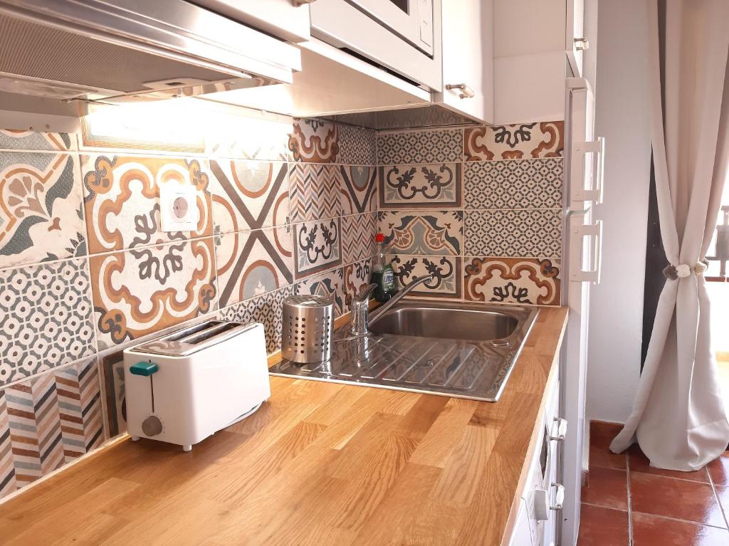 Kuchyň nebo kuchyňský kout v ubytování Tenerife Beach Apartment Adeje