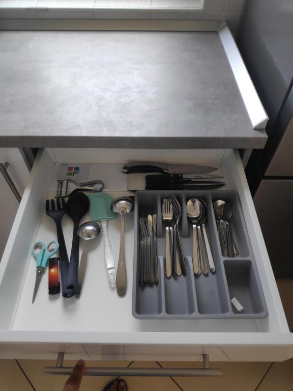 Kuchyň nebo kuchyňský kout v ubytování Apartman Ema