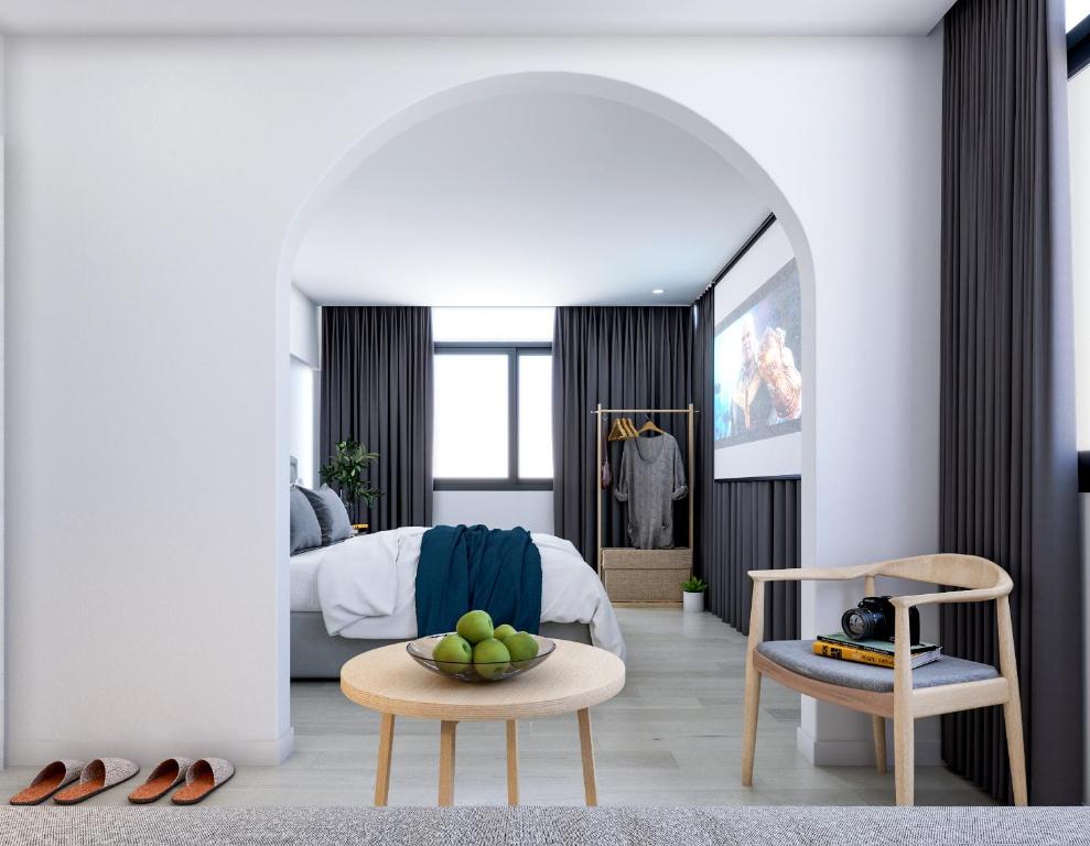 Postel nebo postele na pokoji v ubytování Xiamen 12 Seaside Hotel