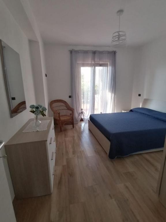 Posteľ alebo postele v izbe v ubytovaní La casa del sole (arcomagno San Nicola Arcella)