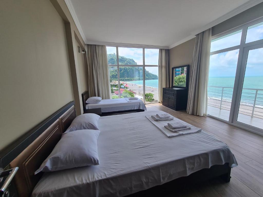 Postel nebo postele na pokoji v ubytování Black Sea Hotel