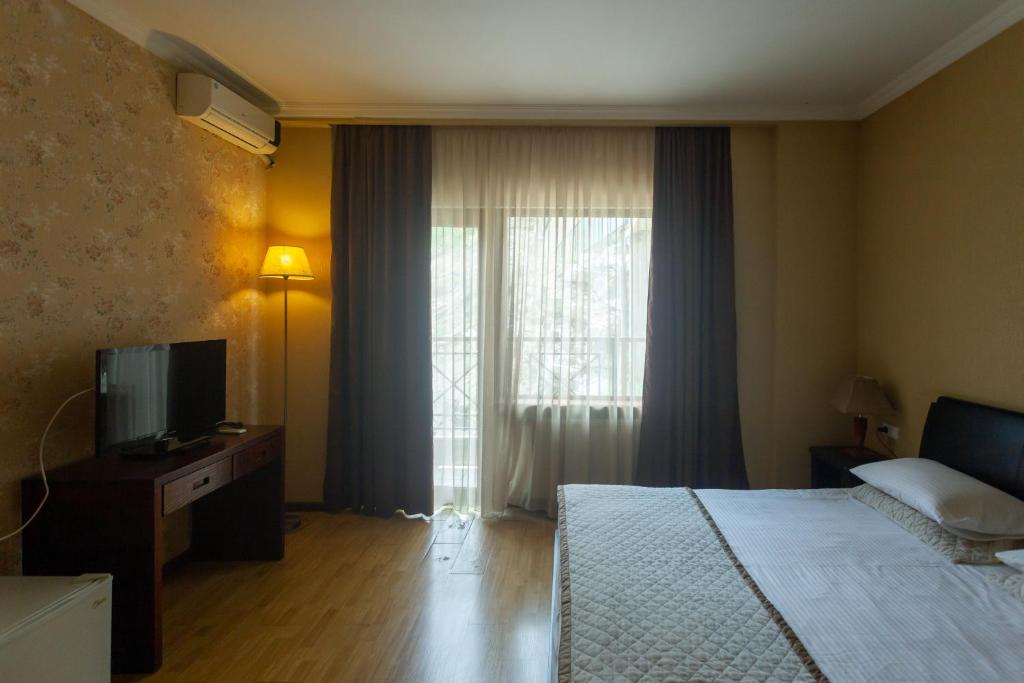 Hotel Beaumonde Garden - Habitación Familiar Estándar