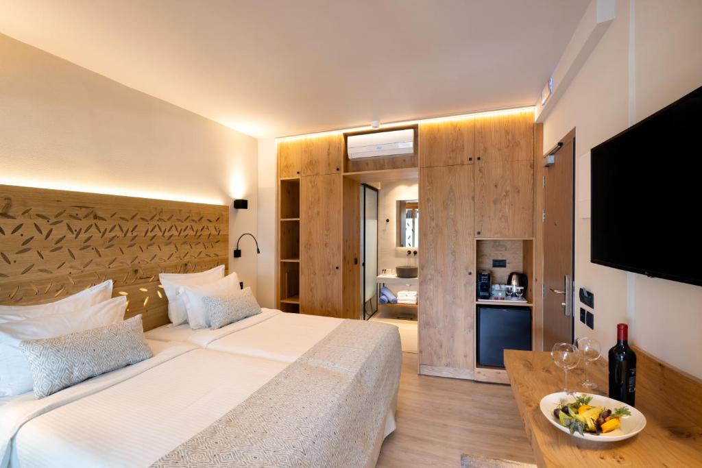 TV a/nebo společenská místnost v ubytování Atlantis Beach Hotel