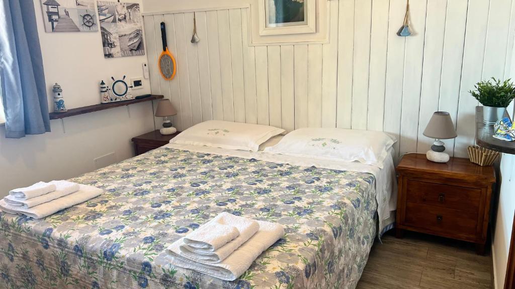 Postel nebo postele na pokoji v ubytování Summer Paradise