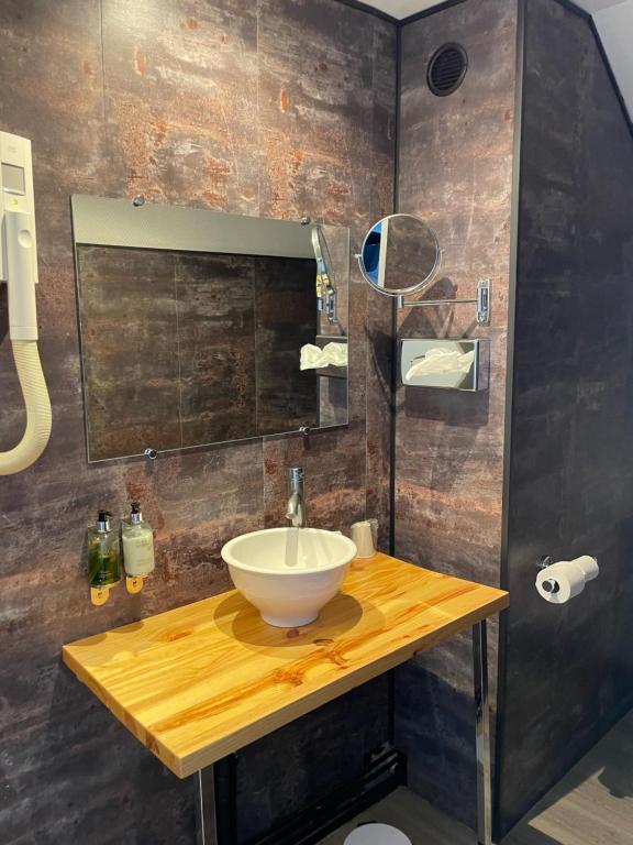 Koupelna v ubytování Le Nouvel Hôtel