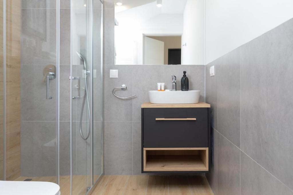 Koupelna v ubytování Horizon Park Apartment by Noclegi Renters
