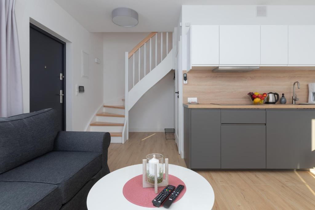 Kuchyň nebo kuchyňský kout v ubytování Horizon Park Apartment by Noclegi Renters