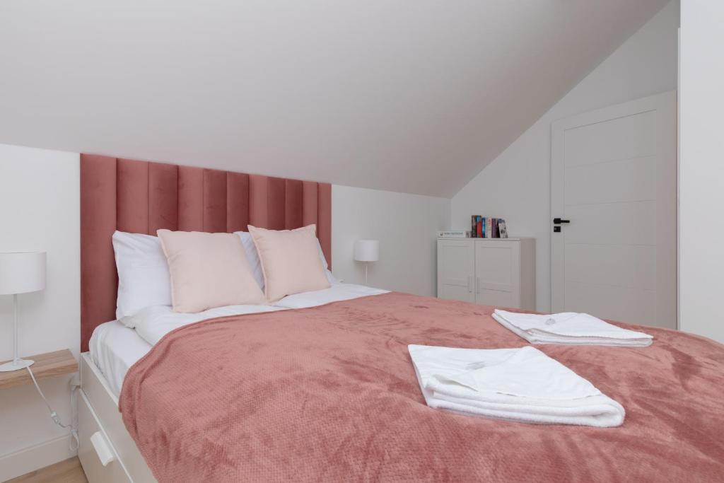 Postel nebo postele na pokoji v ubytování Horizon Park Apartment by Noclegi Renters