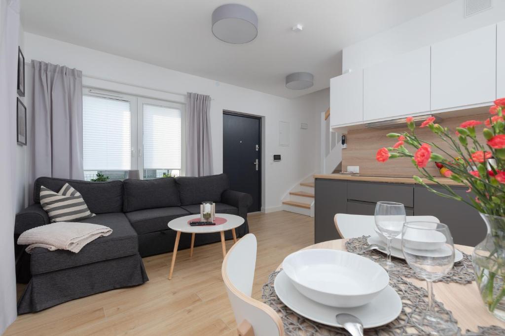 Posezení v ubytování Horizon Park Apartment by Noclegi Renters