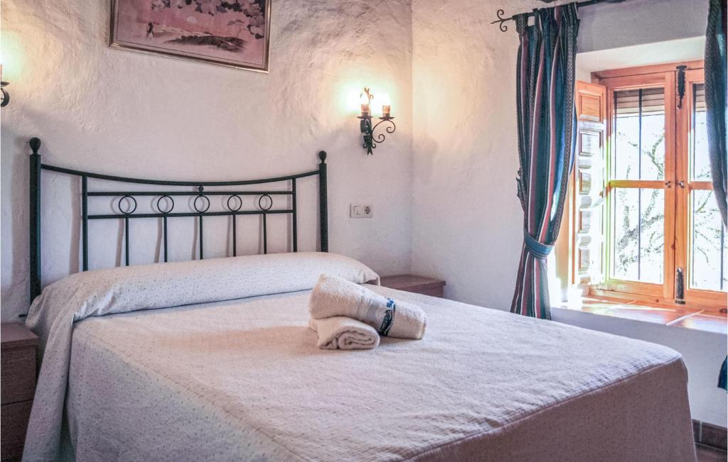 Posteľ alebo postele v izbe v ubytovaní Cozy Home In Villanueva Del Rosario