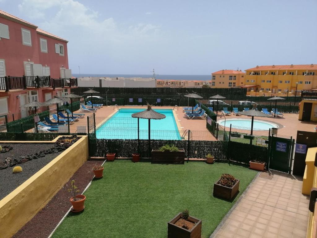 a view of a swimming pool in a building at Antigua Bay- Casa Margarita in Costa de Antigua