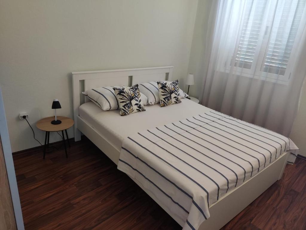 Posteľ alebo postele v izbe v ubytovaní Apartment Dalma