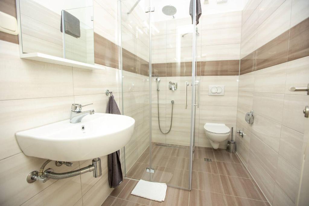 Kúpeľňa v ubytovaní Apartments Mosor