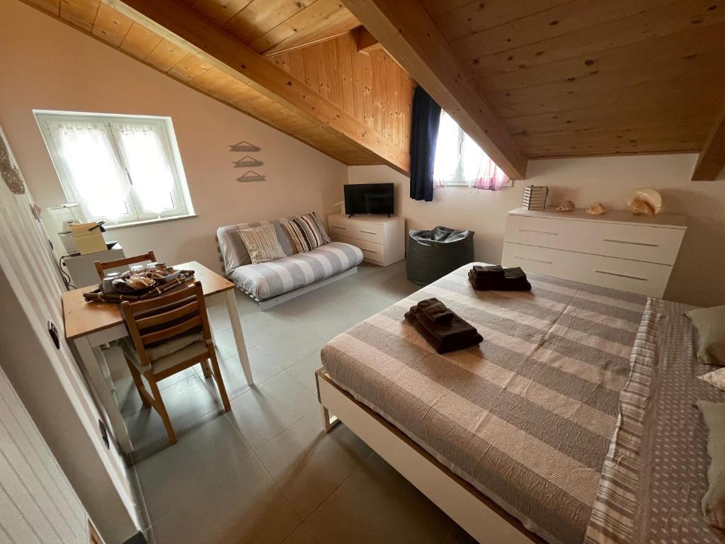Postel nebo postele na pokoji v ubytování Ca' di Bianca