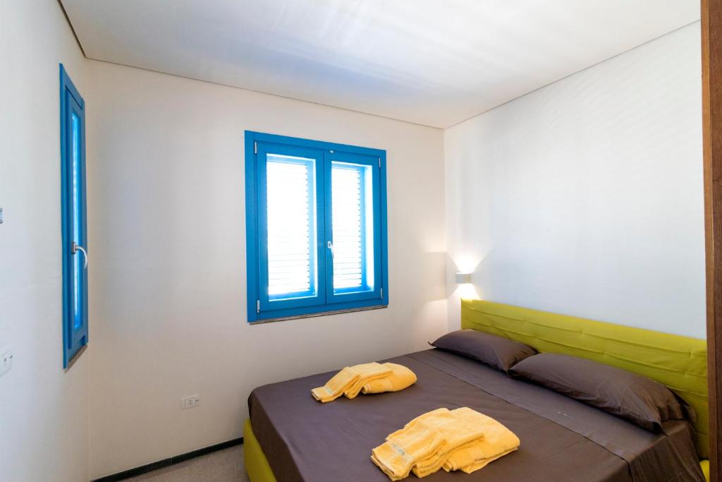 Postel nebo postele na pokoji v ubytování Solmaris Seaside - B&B sul mare