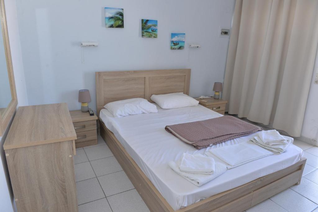 Postel nebo postele na pokoji v ubytování Blue Rooms