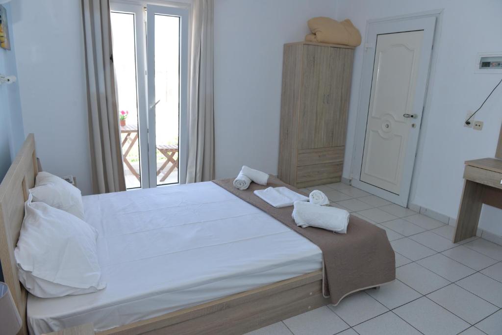Postel nebo postele na pokoji v ubytování Blue Rooms