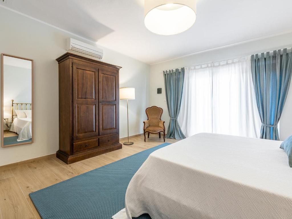 Postel nebo postele na pokoji v ubytování Villa Iole Apartment