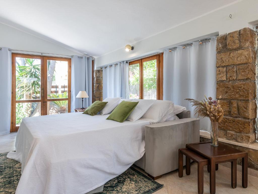 Postel nebo postele na pokoji v ubytování Villa Iole Apartment