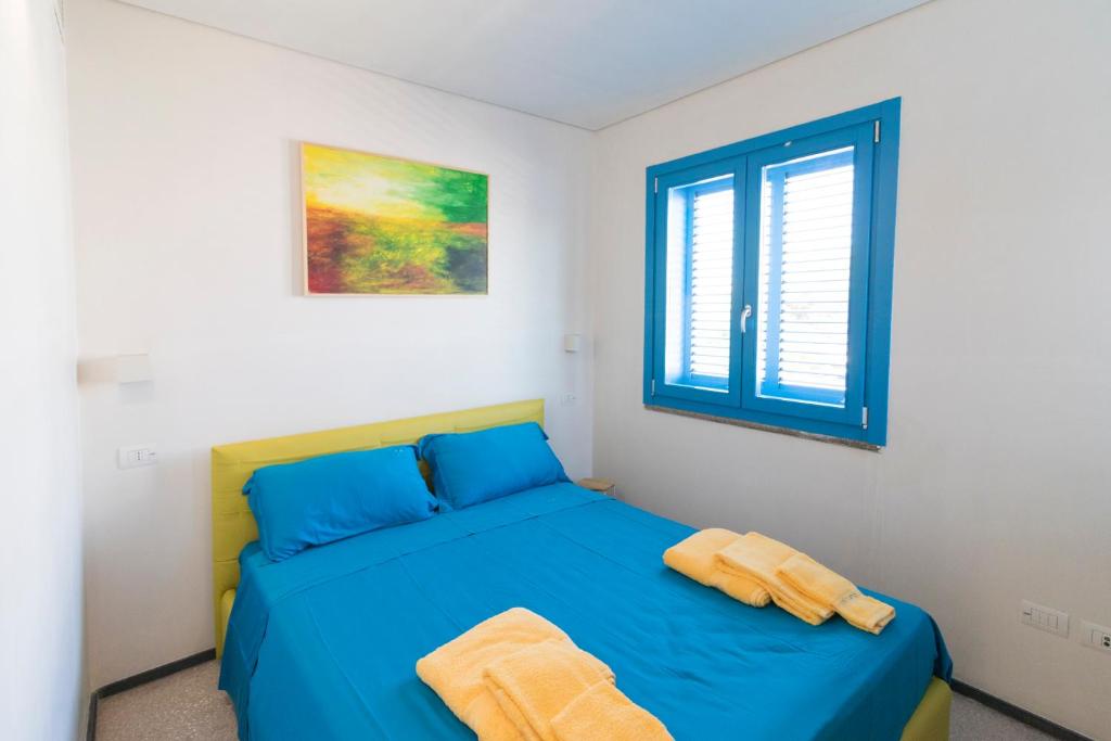 Postel nebo postele na pokoji v ubytování Solmaris Seaside - B&B sul mare