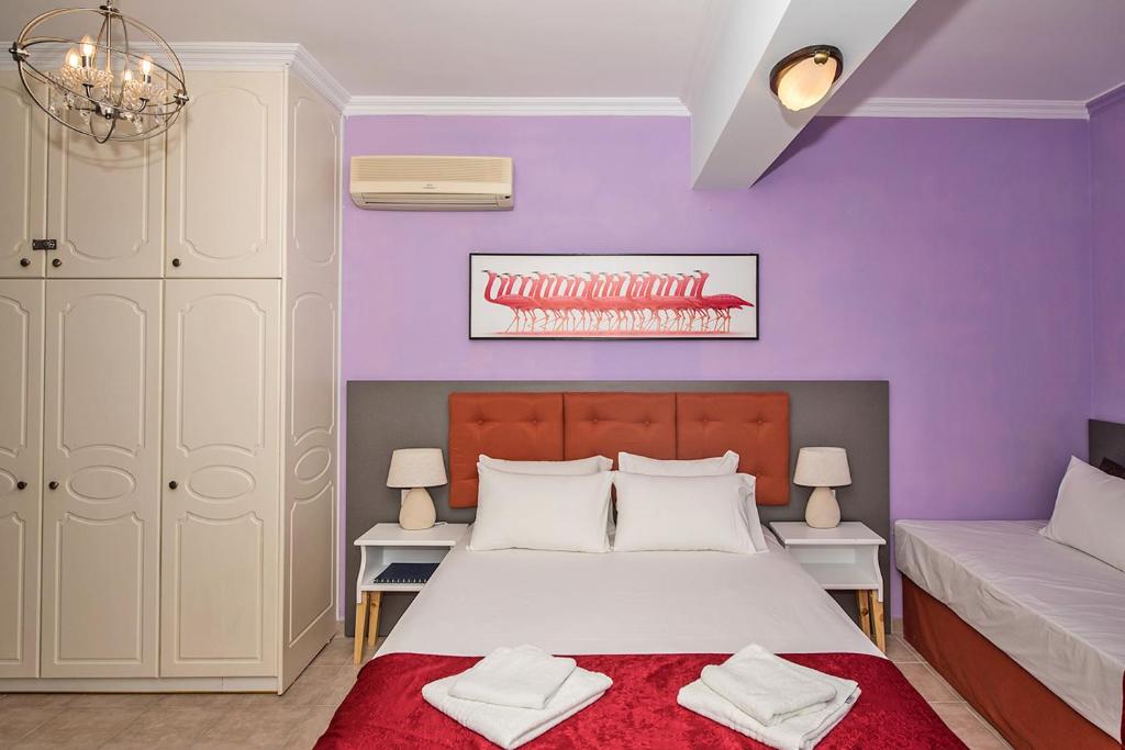 Postel nebo postele na pokoji v ubytování Andretina Sea View Apartments