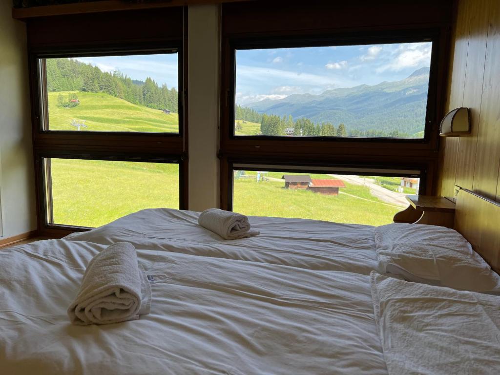 Postel nebo postele na pokoji v ubytování Hotel D'La Varda