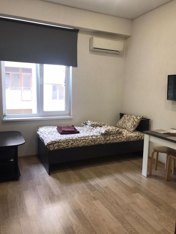 Postel nebo postele na pokoji v ubytování Apartments na Beregu