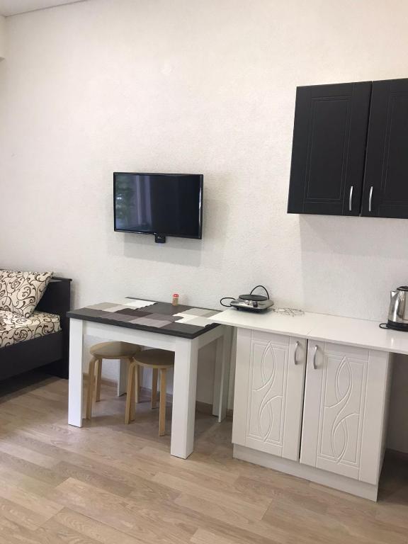 Kuchyň nebo kuchyňský kout v ubytování Apartments na Beregu