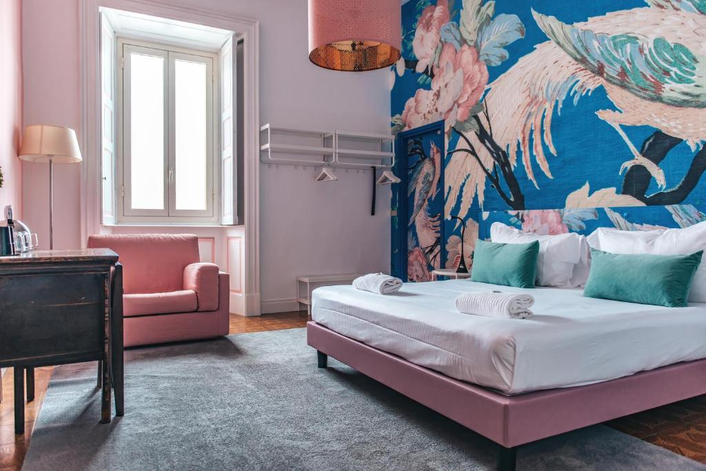 Voodi või voodid majutusasutuse Hotel Casa Camilla toas