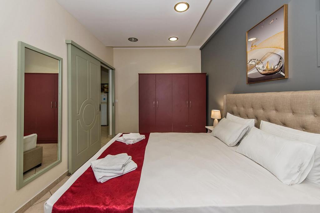 Postel nebo postele na pokoji v ubytování Andretina Sea View Apartments