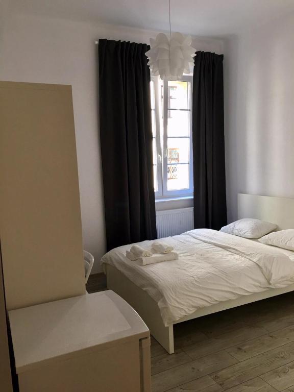 Ліжко або ліжка в номері ORION Apartments