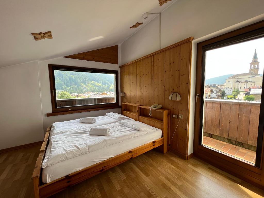 Postel nebo postele na pokoji v ubytování Hotel D'La Varda