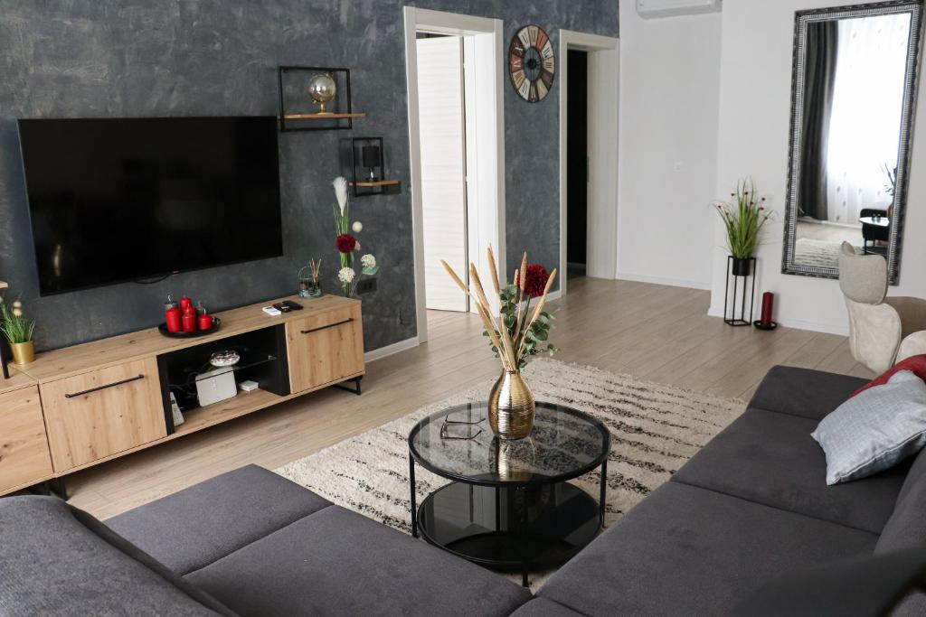 Televízia a/alebo spoločenská miestnosť v ubytovaní 'NAP' apartment