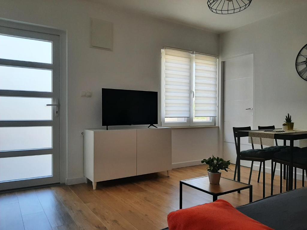 Telewizja i/lub zestaw kina domowego w obiekcie Nozret