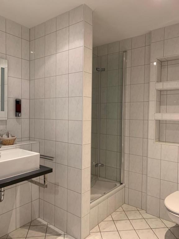Koupelna v ubytování HGH - Hotel Garni Helbig