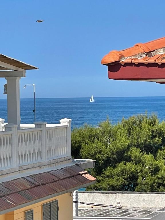 a view of the ocean from a house at Casa Libera in Savelletri di Fasano