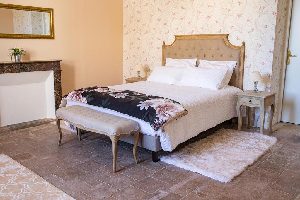Postel nebo postele na pokoji v ubytování L'écrin de l'Orb