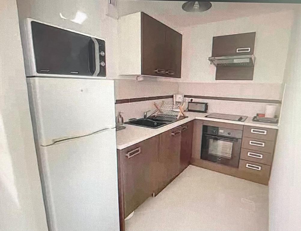 Kuchyňa alebo kuchynka v ubytovaní Superbe appartement à Saint Pierre la Mer