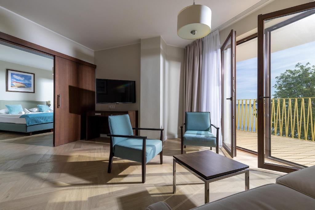 Hotel Meridian - Deluxe Suite Met Bay -view En Terras