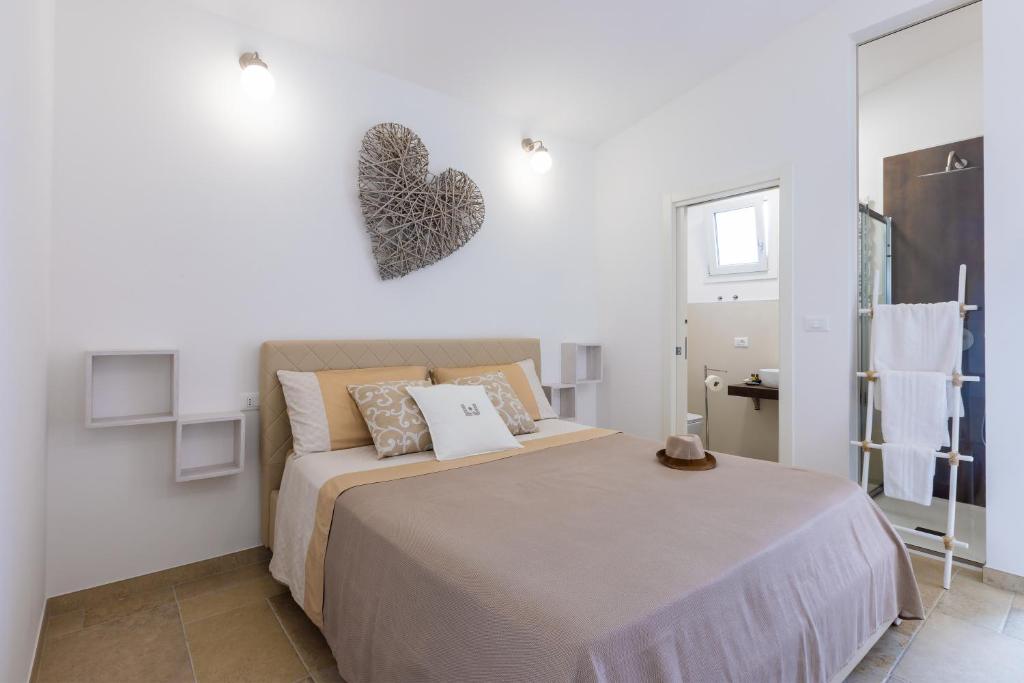 A bed or beds in a room at Valentinus