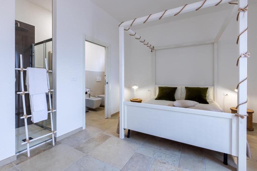 A bed or beds in a room at Valentinus