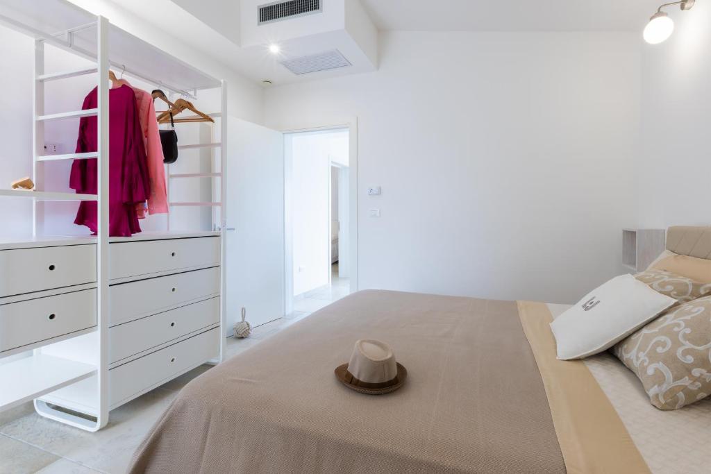 A bed or beds in a room at Valentinus