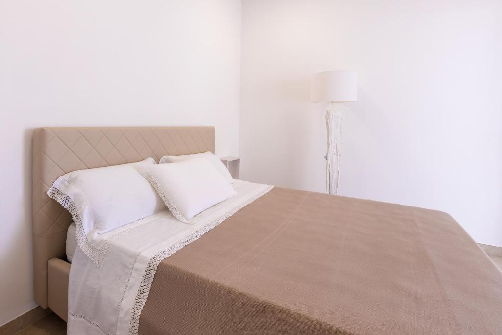 A bed or beds in a room at Valentinus