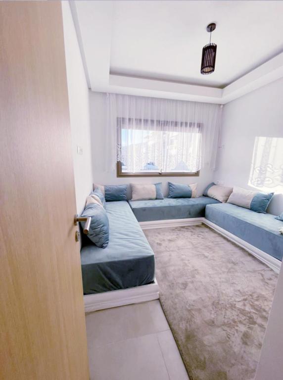 Posezení v ubytování appartement haut standing en résidence Cabo Huerto vue sur deux grand Piscine
