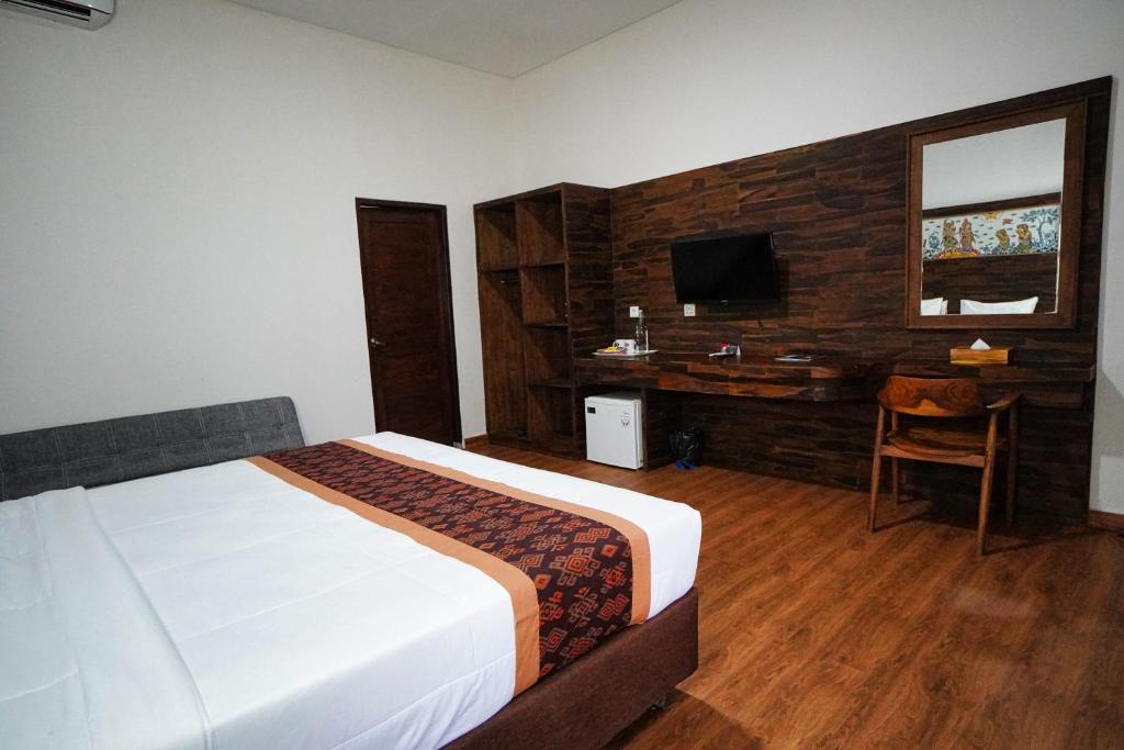 Postel nebo postele na pokoji v ubytování Adil Villa & Resort