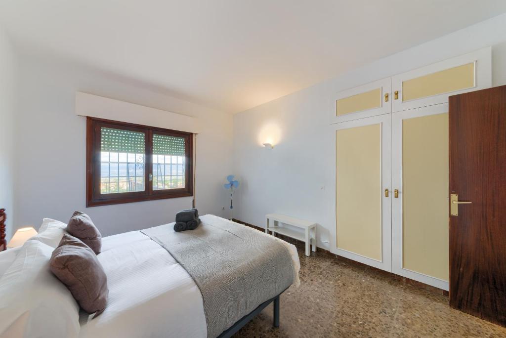 Posteľ alebo postele v izbe v ubytovaní Holidays2Malaga Andalusian house style with pool in Alhaurin de la Torre