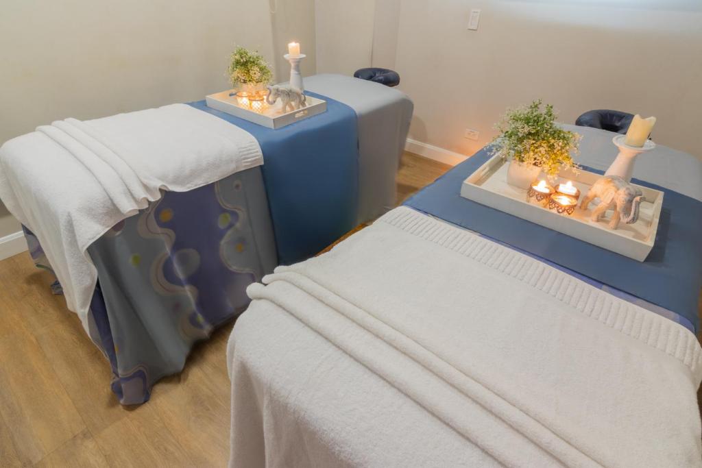 Postel nebo postele na pokoji v ubytování Sonesta Hotel Cali