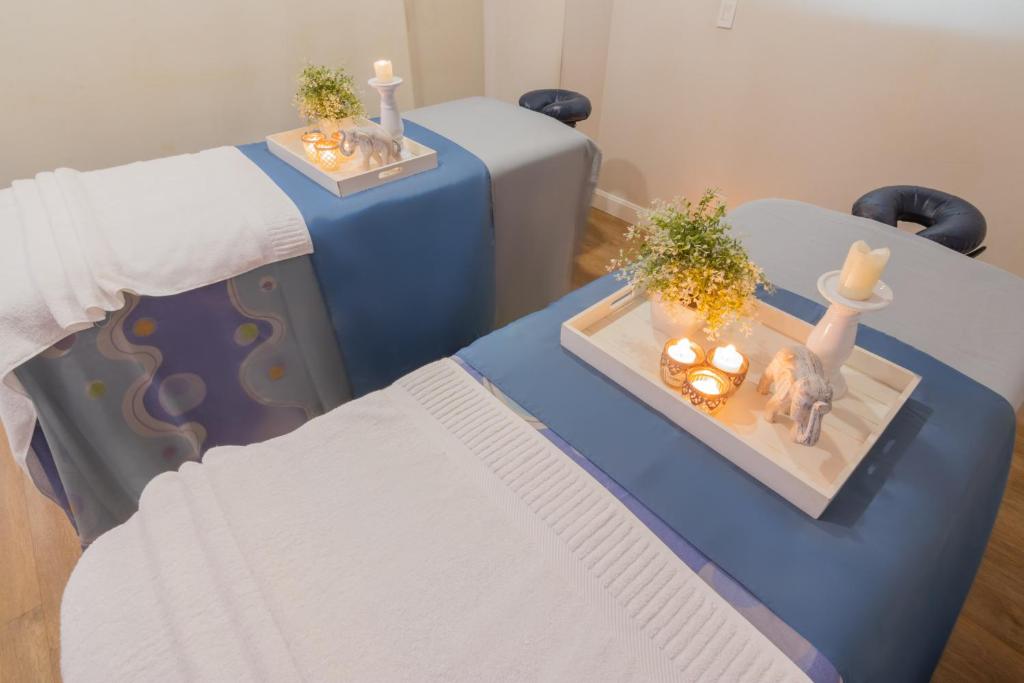 Postel nebo postele na pokoji v ubytování Sonesta Hotel Cali